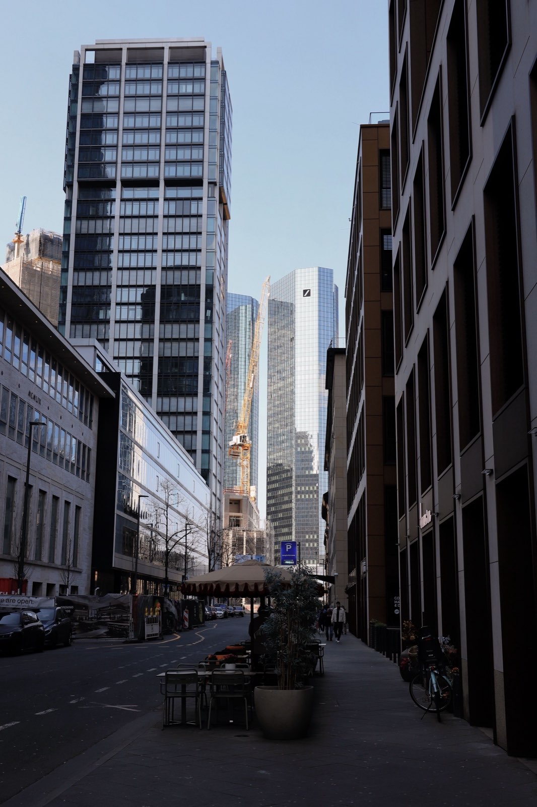 Bank towers seen down a narrow city street